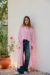 Fringed out cape in pink