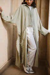 Fringed out cape in olive