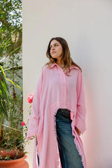 Fringed out cape in pink