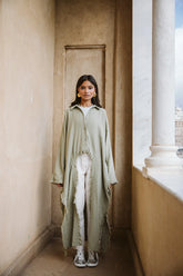 Fringed out cape in olive