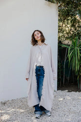 Fringed out cape in Beige