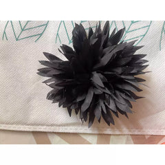 Black flower pin medium size