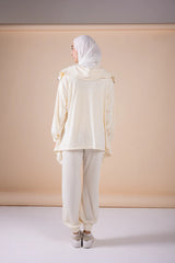 The asymmetrical set in offwhite