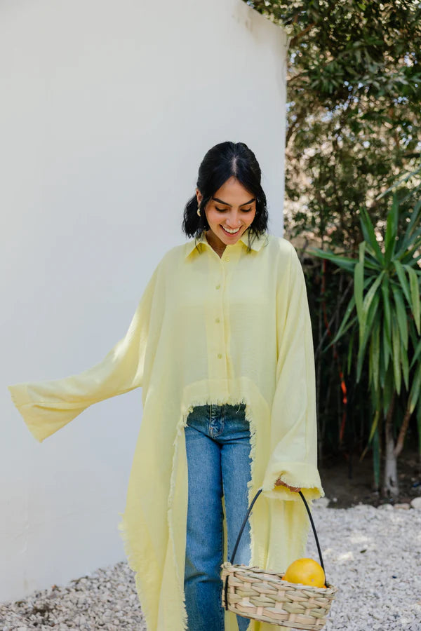 Fringed out cape in Yellow