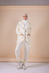 The asymmetrical set in offwhite