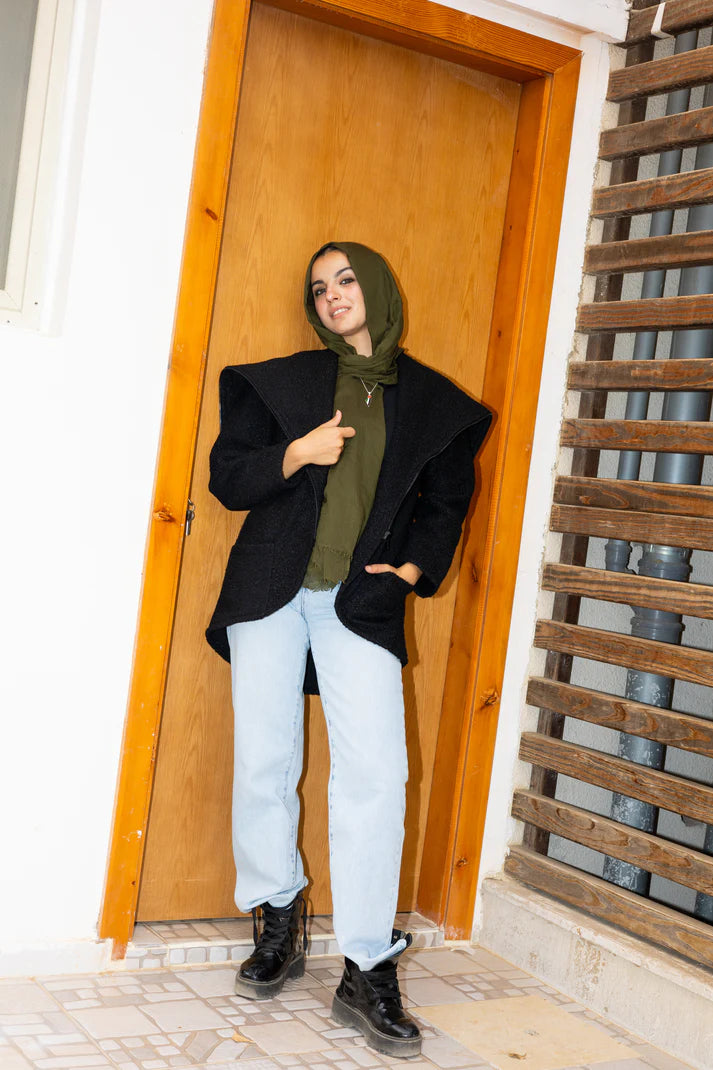 The furry jacket in black