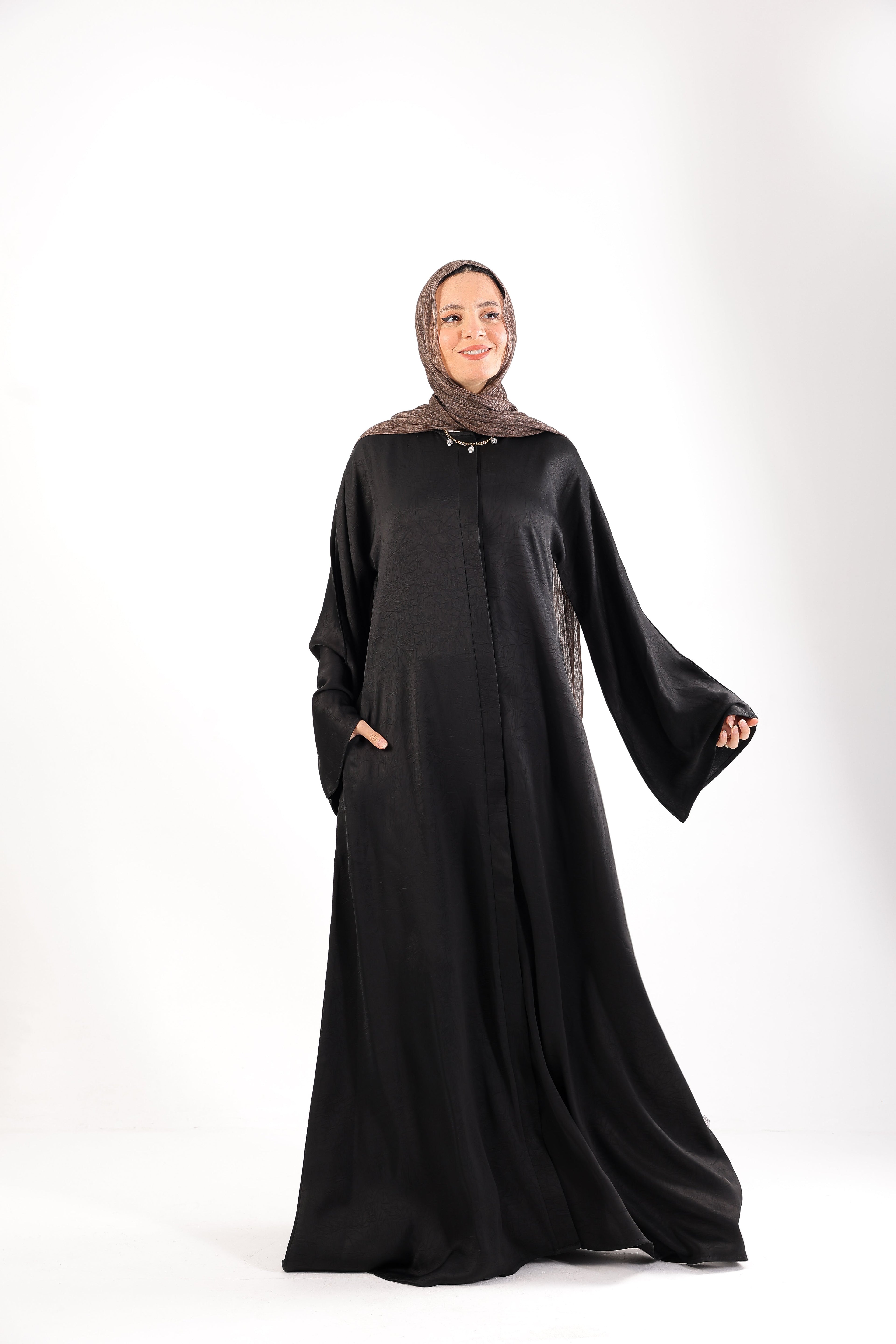 our Jacquard Silk Abaya with hidden buttons and Pockets 
Code 800B