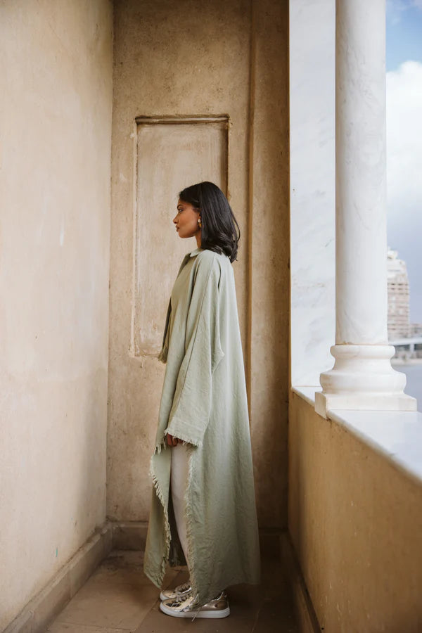 Fringed out cape in olive