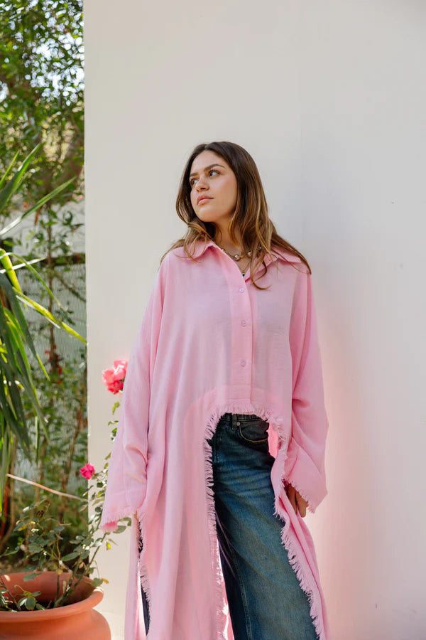 Fringed out cape in pink