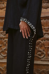 Most wanted pearls set in black