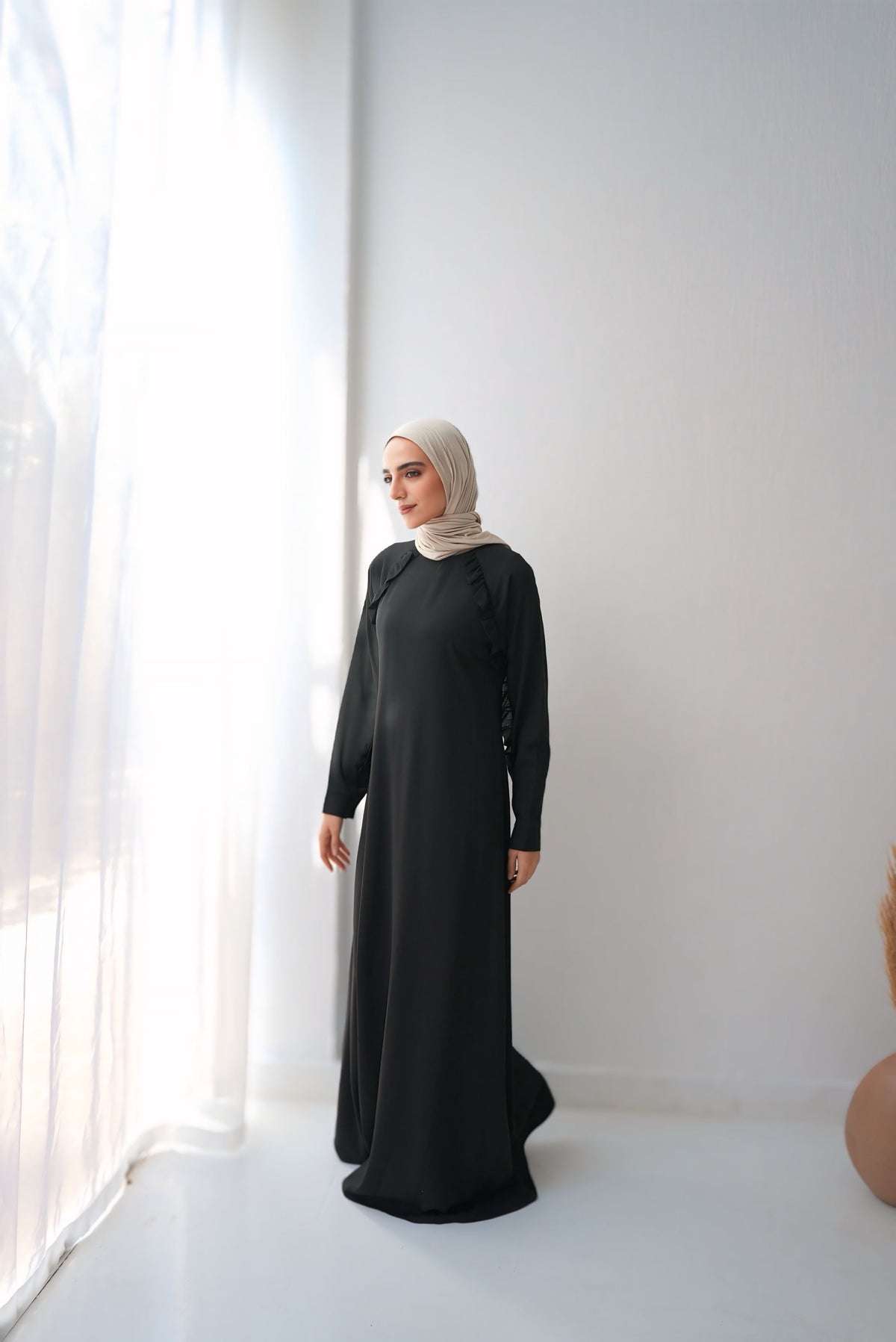 Rony Soft crepe abaya with delicate ruffles on the chest and sleeves Code 409