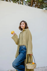 Fringed out cape in lime