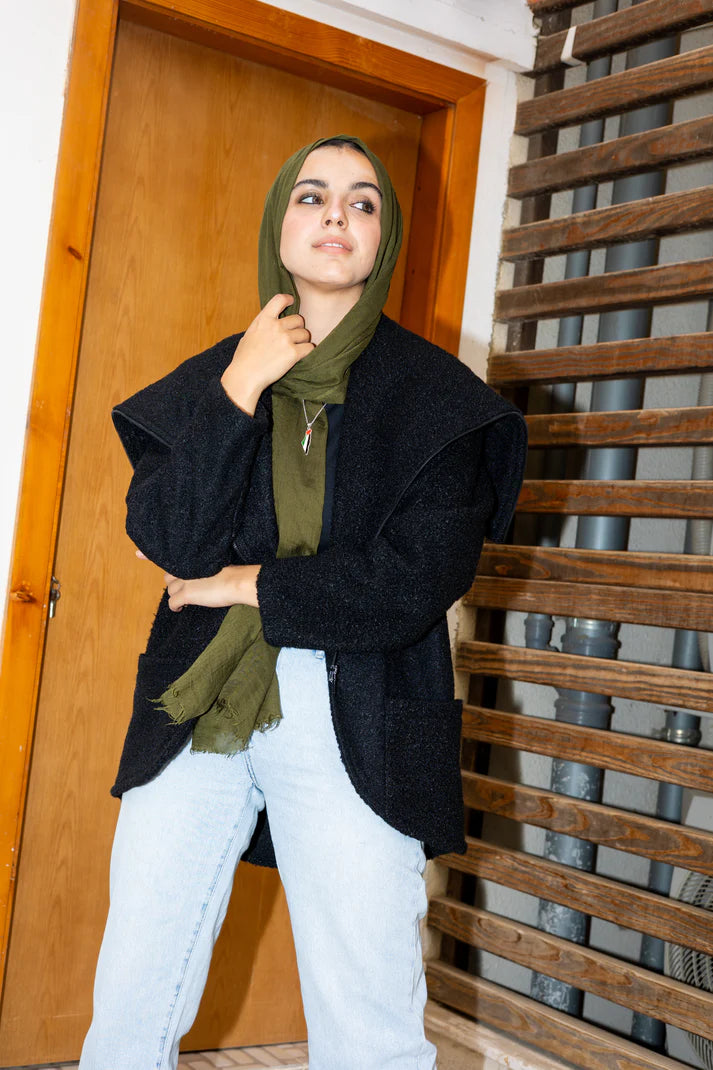 The furry jacket in black
