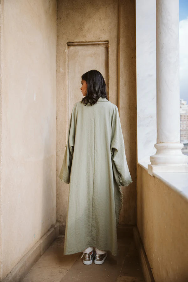 Fringed out cape in olive