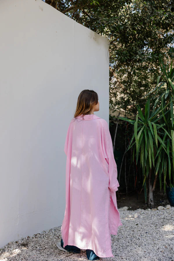 Fringed out cape in pink