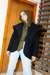 The furry jacket in black