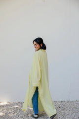 Fringed out cape in Yellow