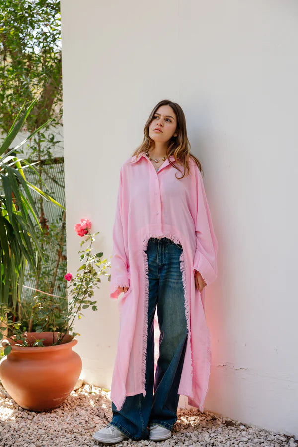 Fringed out cape in pink