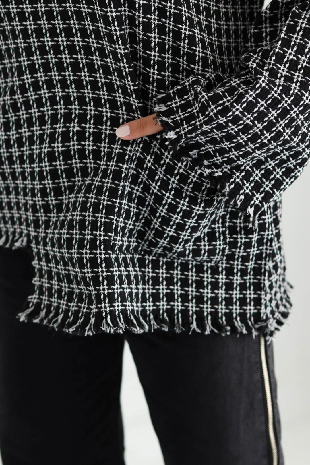 Black XO’ tweed top