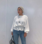 The Essential Ruffled Blouse